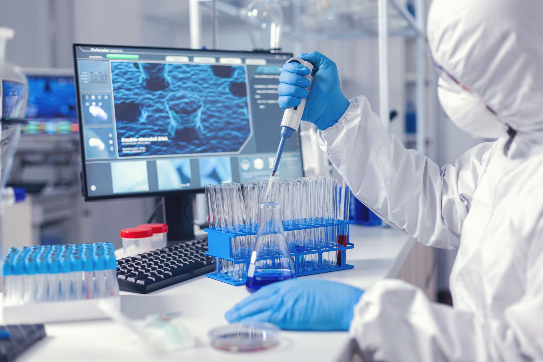 Forensic scientist conducting DNA analysis in laboratory